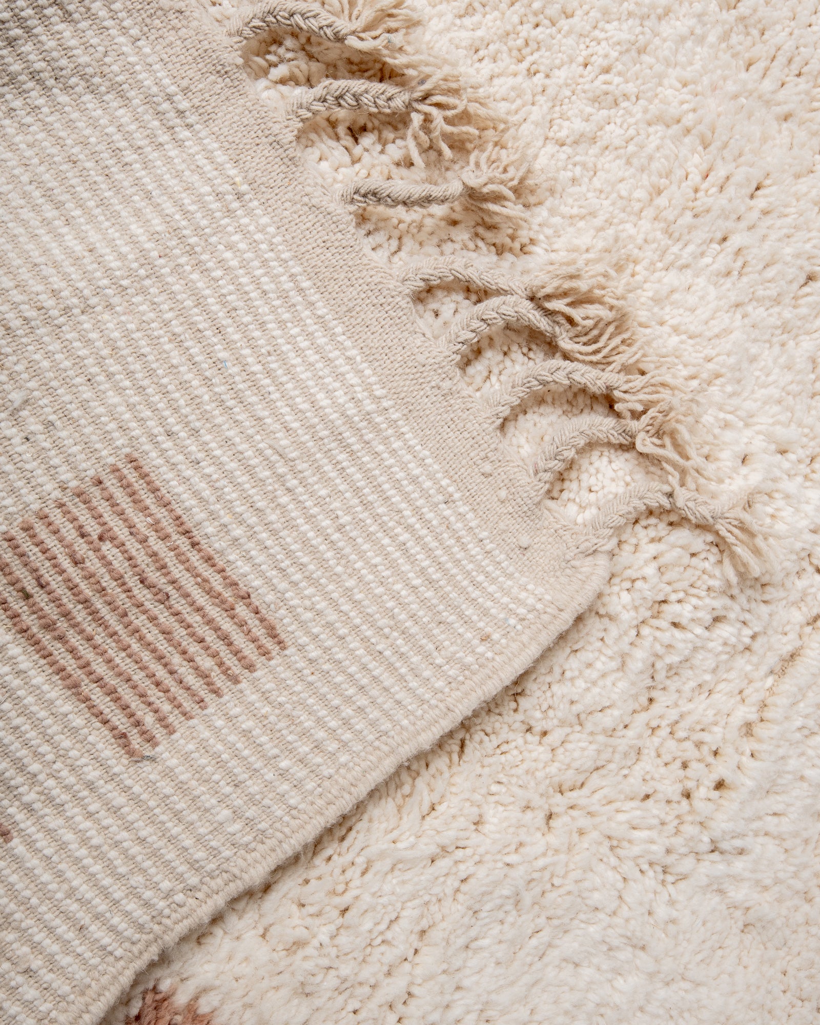 Modern, designer, handcrafted Berber rug from Morocco. Beniourain carpet with beautiful colours and patterns and fluffy wool texture.